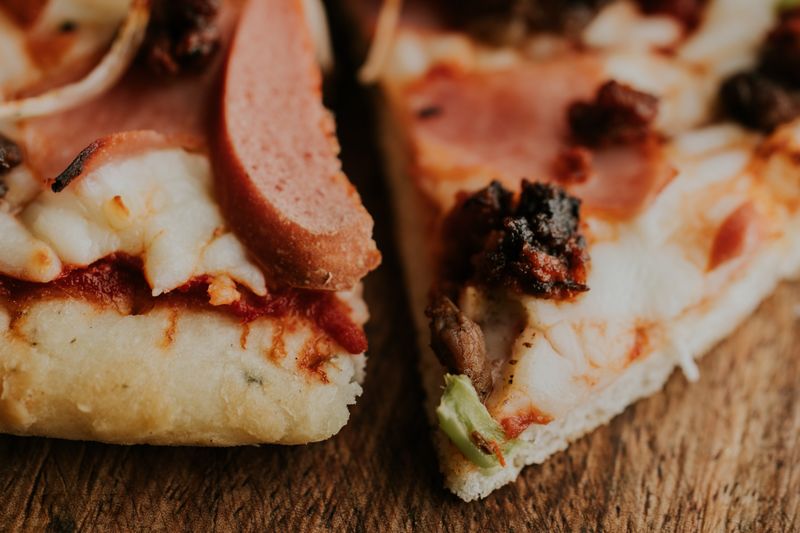 Spicy Italian Sausage round table pizza